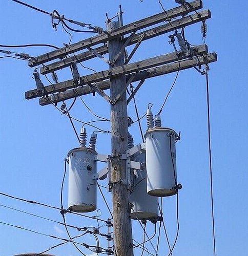 Pole-mounted three single-phase distribution transformers. Image usedcourtesy of Wikimedia.